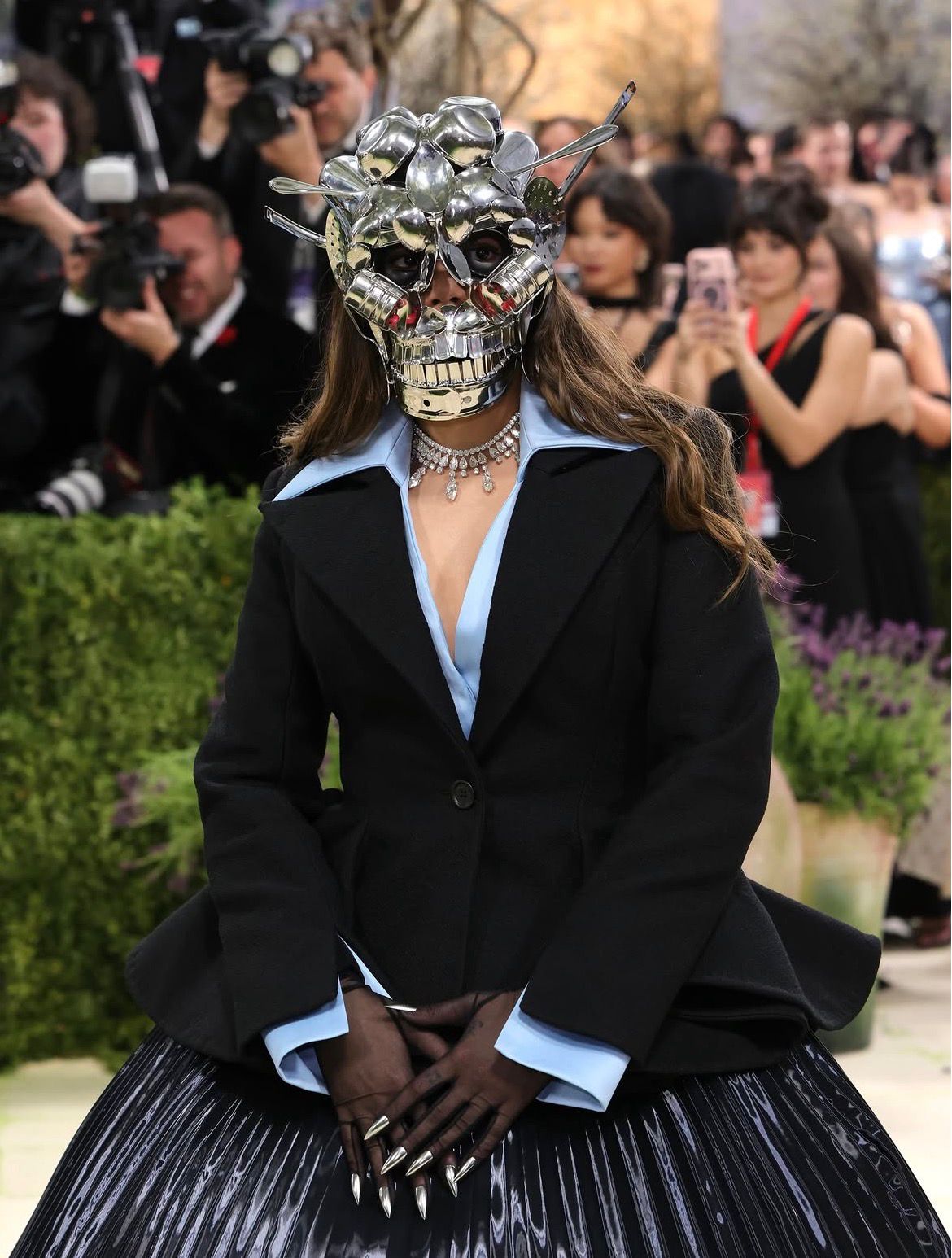 Ananya Birla on the Met Gala 2026 red carpet, In custom Robert Wun couture, with a sculptural mask